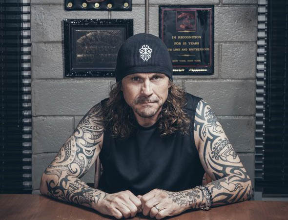 Kurt Sutter poses for a picture.